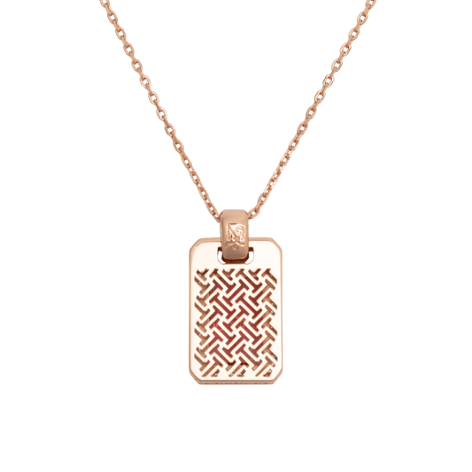 Rose gold necklace with a rectangular pendant on a green background | Zodori Jewelry