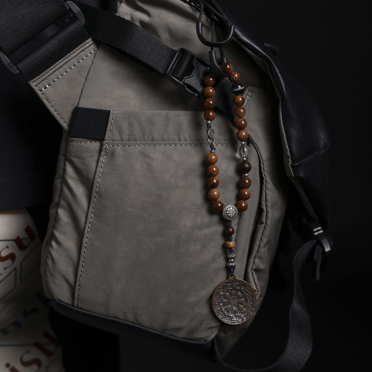 Unity Light Multi-functional Pendant The Unity Light Multi-functional Pendant combines silver, crystal, and precious woods like old sandalwood and cypress with cultural motifs such as the Nine-Palace medallion. Its versatile design makes it suitable for daily wear, meditation, or as an elegant decorative piece. A harmonious blend of tradition and modernity, it symbolizes inner light and universal unity, making it a meaningful addition to any collection.